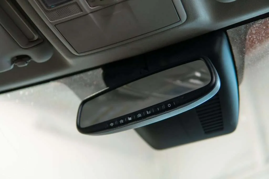 Close-up on a rear view mirror in a car