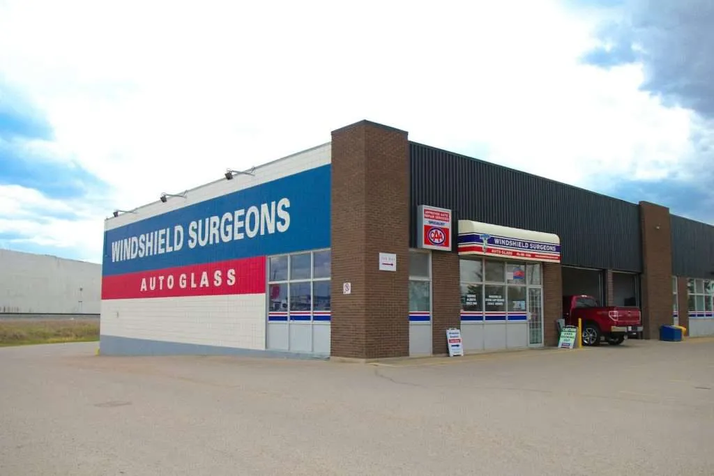 External view of a Windshield Surgeons shop, a clean and inviting location on a sunny day