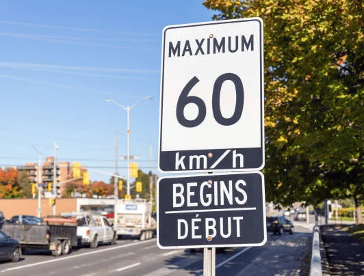 Speed limit traffic sign with the text 